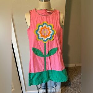 Girls Mini Boden dress with floral appliqué at front.  Zip closure.  Lined.